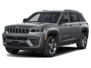 A sleek gray Jeep Grand Cherokee SUV with black rims and accents, facing forwards slightly left.